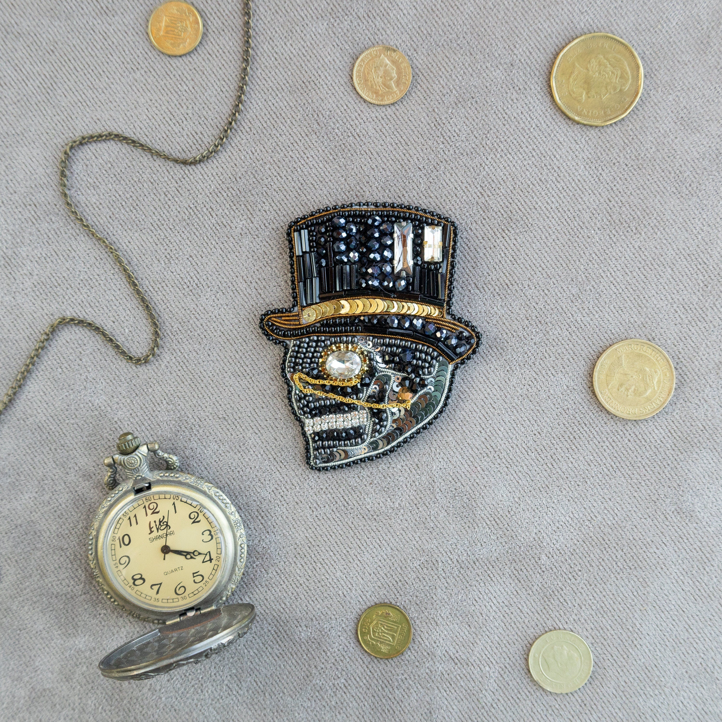 a picture of a clock and some coins